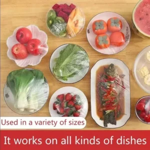 Elastic food cover stretched over large ceramic bowl keeping food fresh in fridge